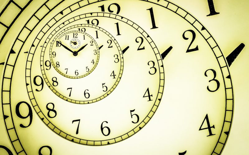 Detail of a used mechanical clock with hypnotic quadrant, very flexible concept